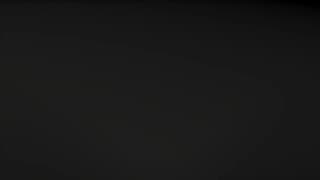 Lana Harding en lingerie de encaje negro haciendo un Striptease